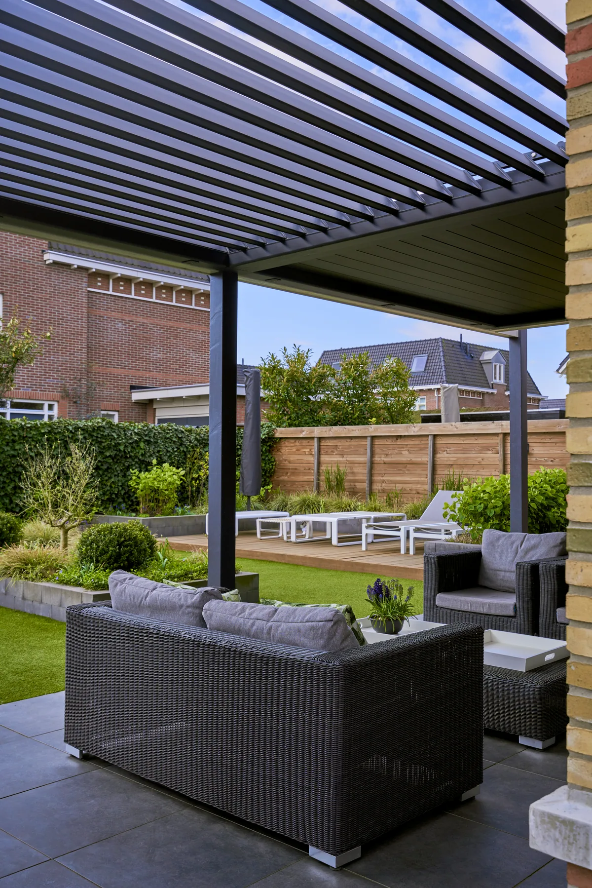 Pinela pergola beside a swimming pool